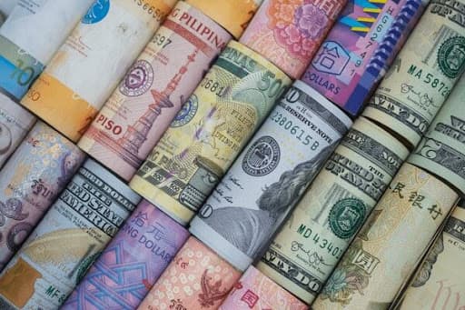 International currency symbols in a sleek metallic finish